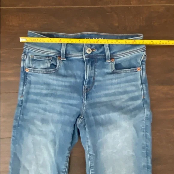 American Eagle Low Rise Bootcut Ripped Blue Jeans Size 0 - Picture 10 of 15